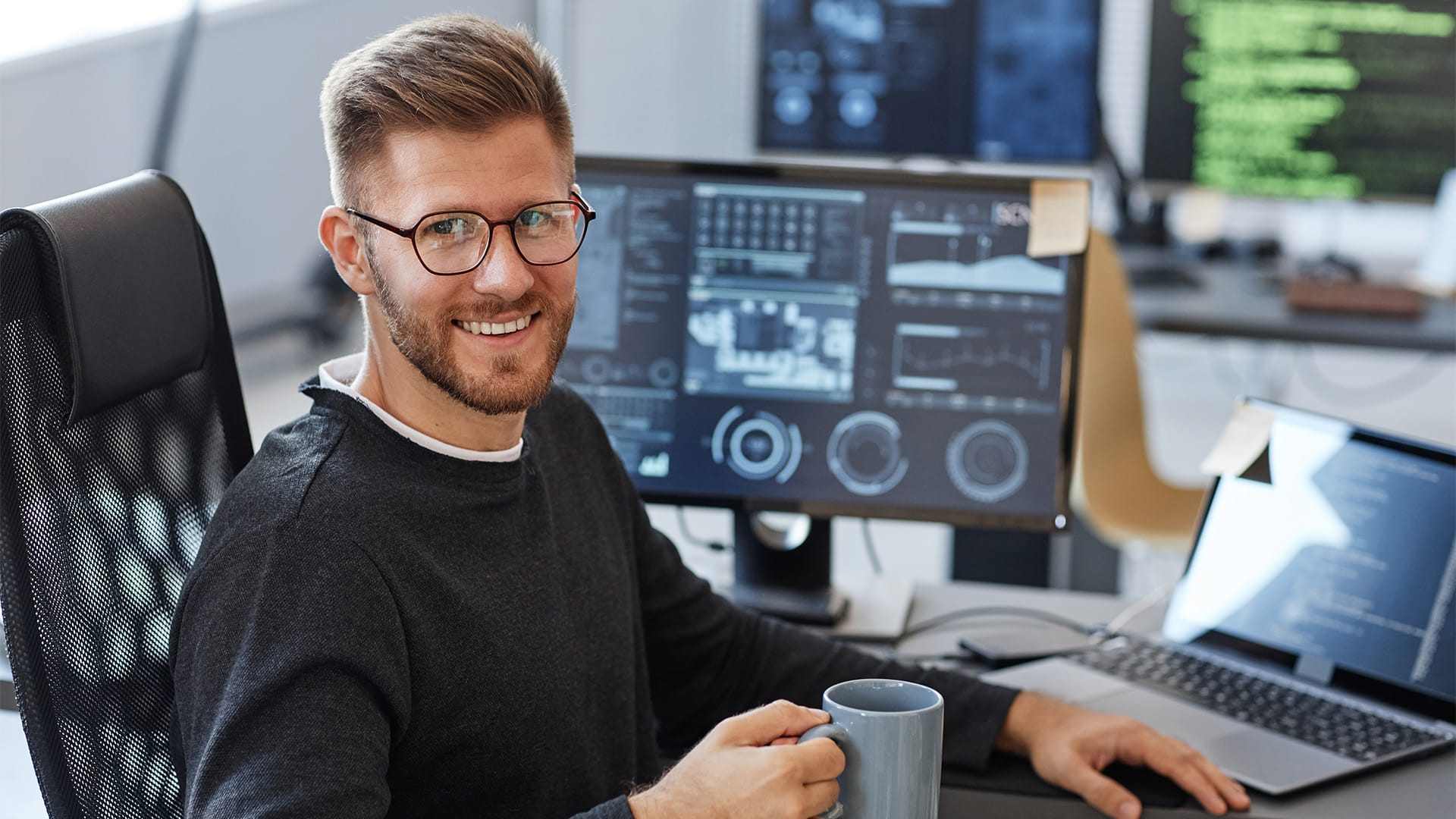 ISTQB Stock 0007 smiling computer programmer at workplace 2023 11 27 04 49 51 utc