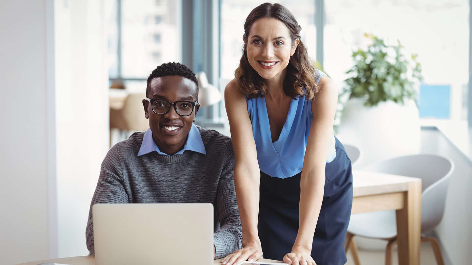 ISTQB Stock 0011 portrait of smiling executives using laptop 2023 11 27 04 51 50 utc